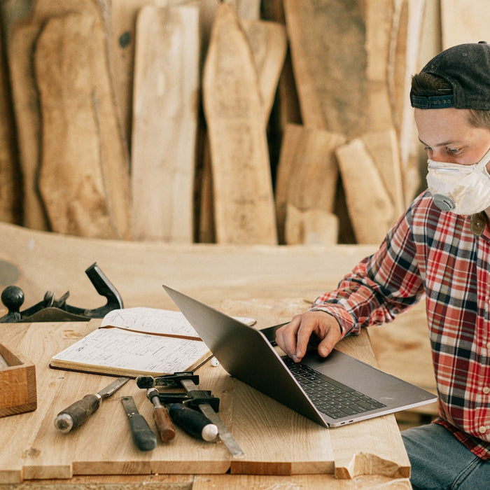 carpenter making timber furniture