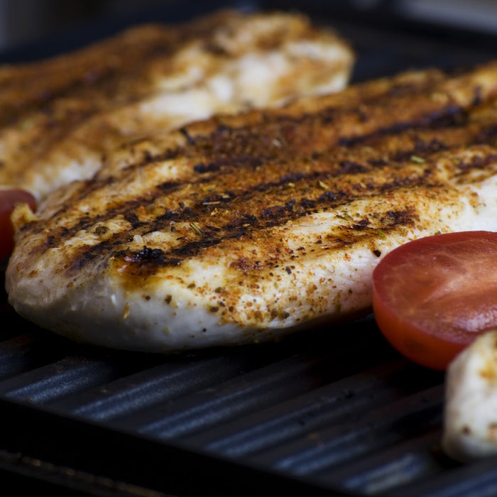 grilling food on grill pan